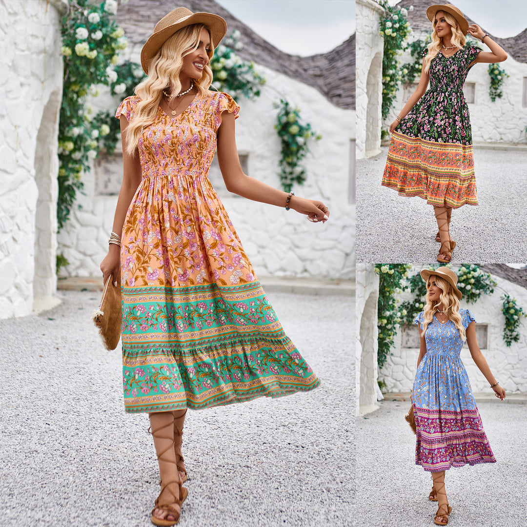 Dame midikjole i bohemian stil med patchwork-mønster og flydende skørt Stilla