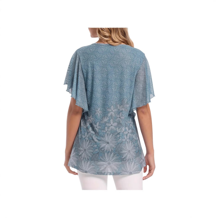 Dame tunika med elegant volang-design og blomstermønster Stilla