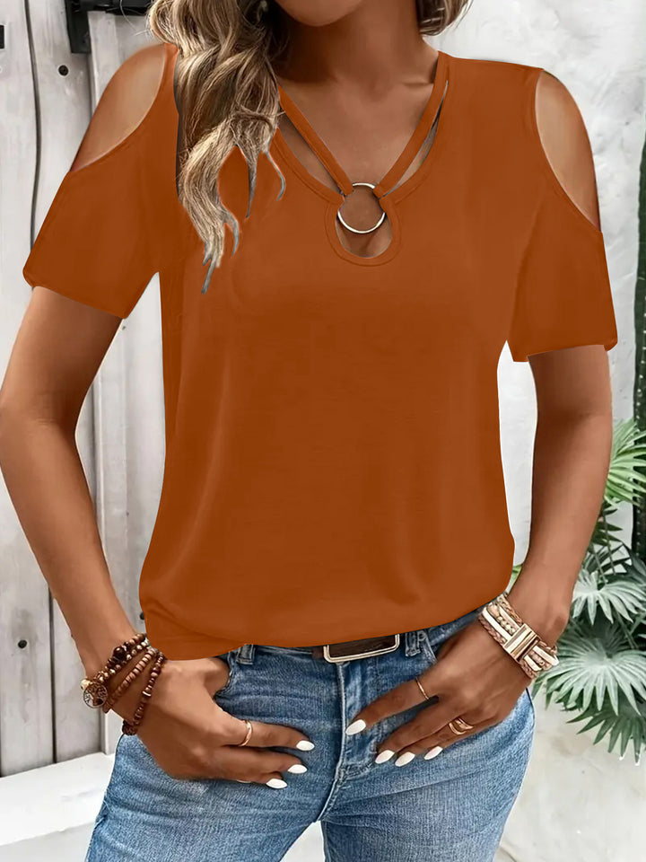 Dame afslappet T-shirt med cut-out ærmer og ringdetalje Stilla