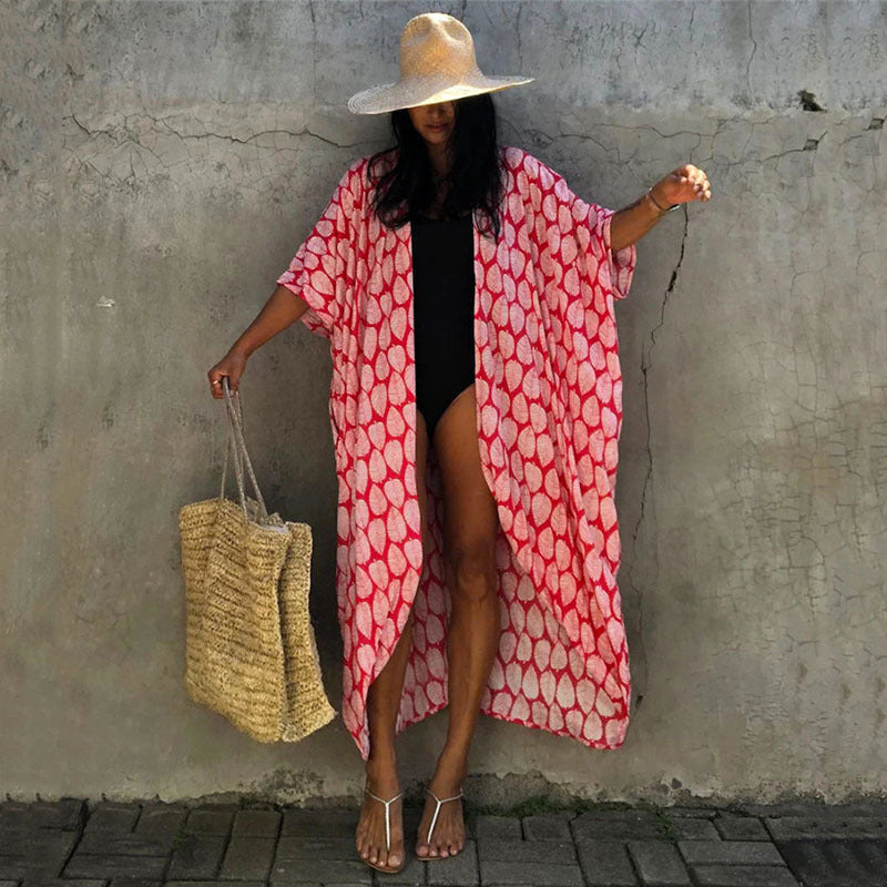 Dame strandkimono med luftigt snit og festligt bladdesign Stilla