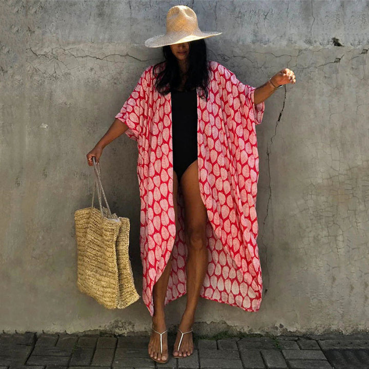 Dame strandkimono med luftigt snit og festligt bladdesign Stilla