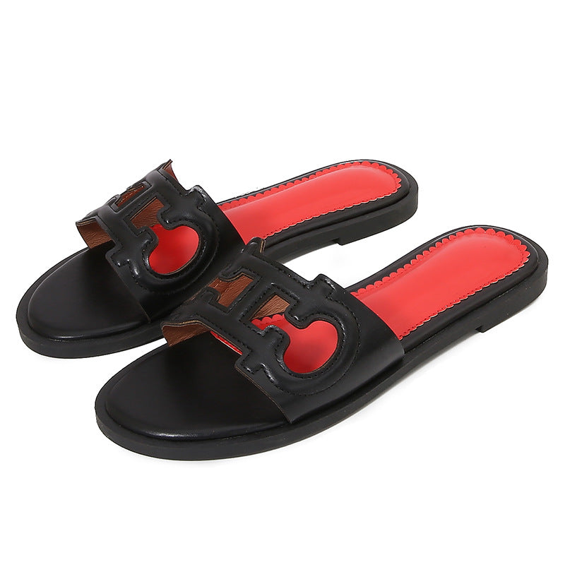 Dame mode slippers med iøjnefaldende logo Stilla