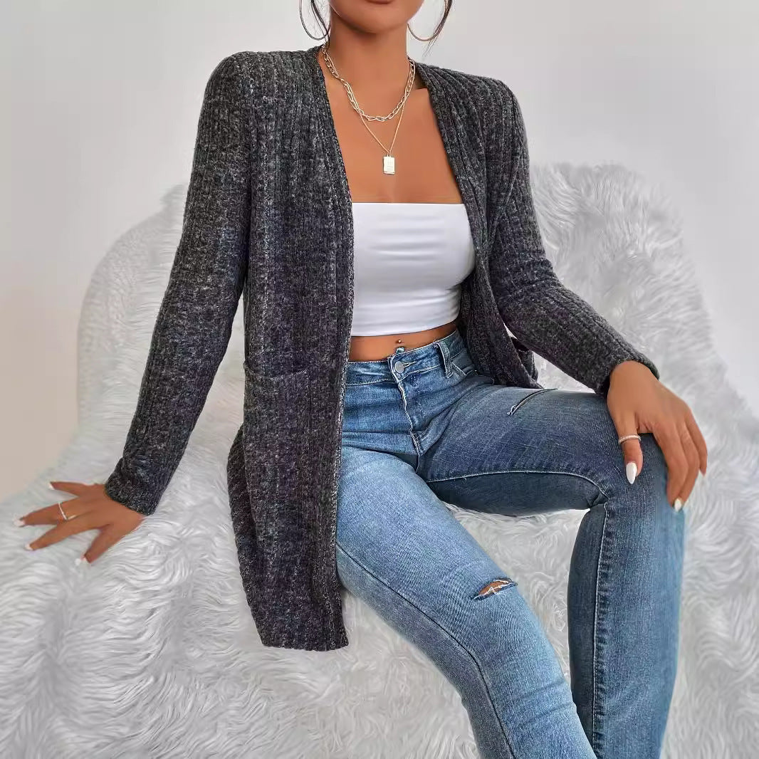 Dame cardigan med struktureret striklook og praktische lommer Stilla