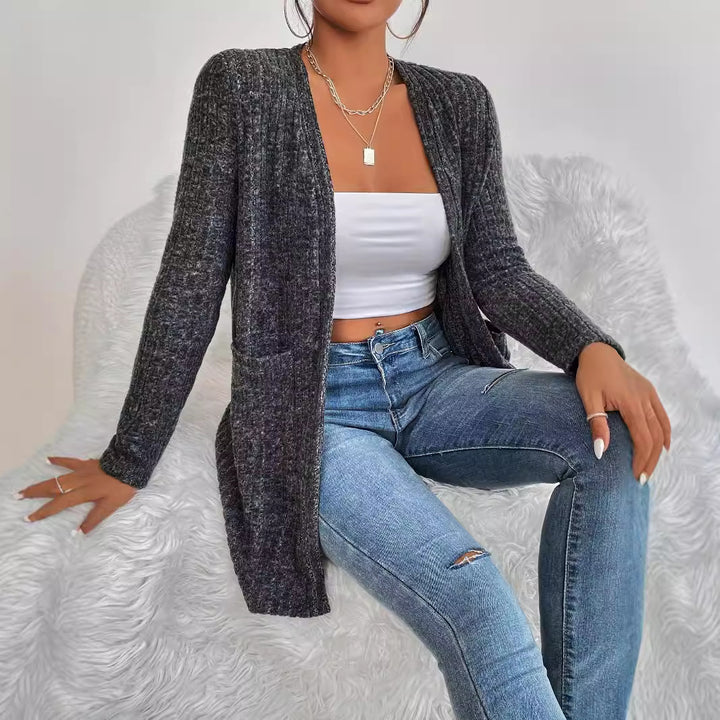 Dame cardigan med struktureret striklook og praktische lommer Stilla