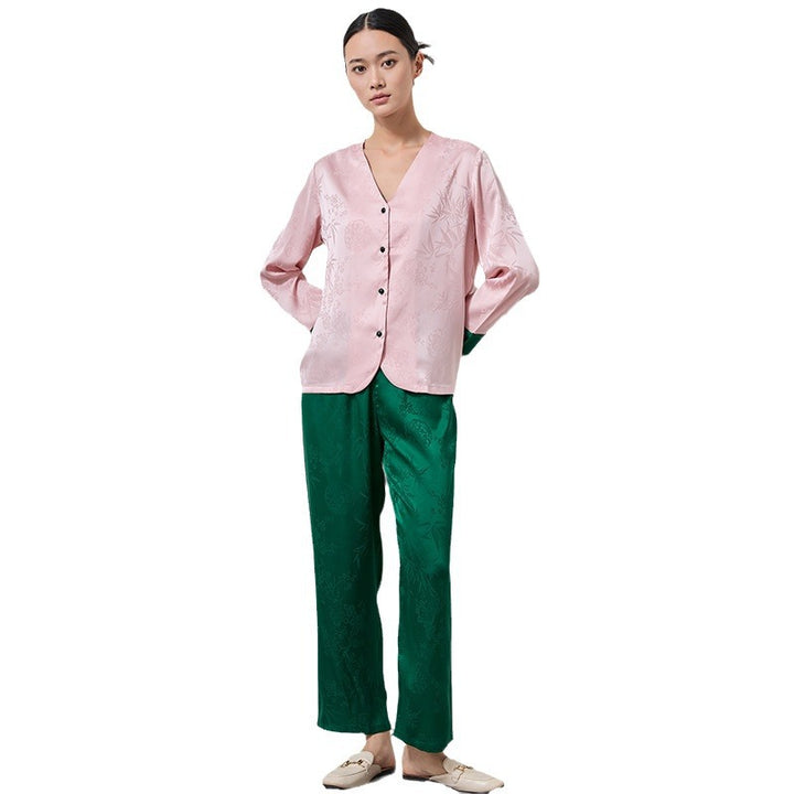 Dame Satin pyjamasæt med delikat blomsterdesign og elegante detaljer Stilla