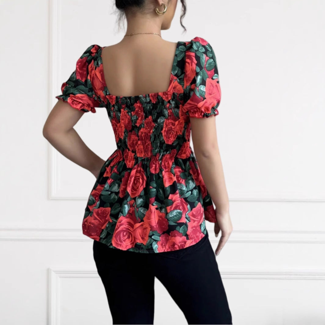 Dame puffærmet bluse med blomstret design og elastisk kant Stilla