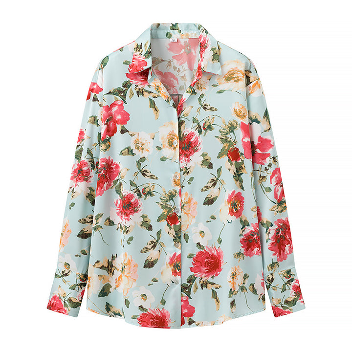 Damebluse med blomsterprint og elegant knapliste Stilla