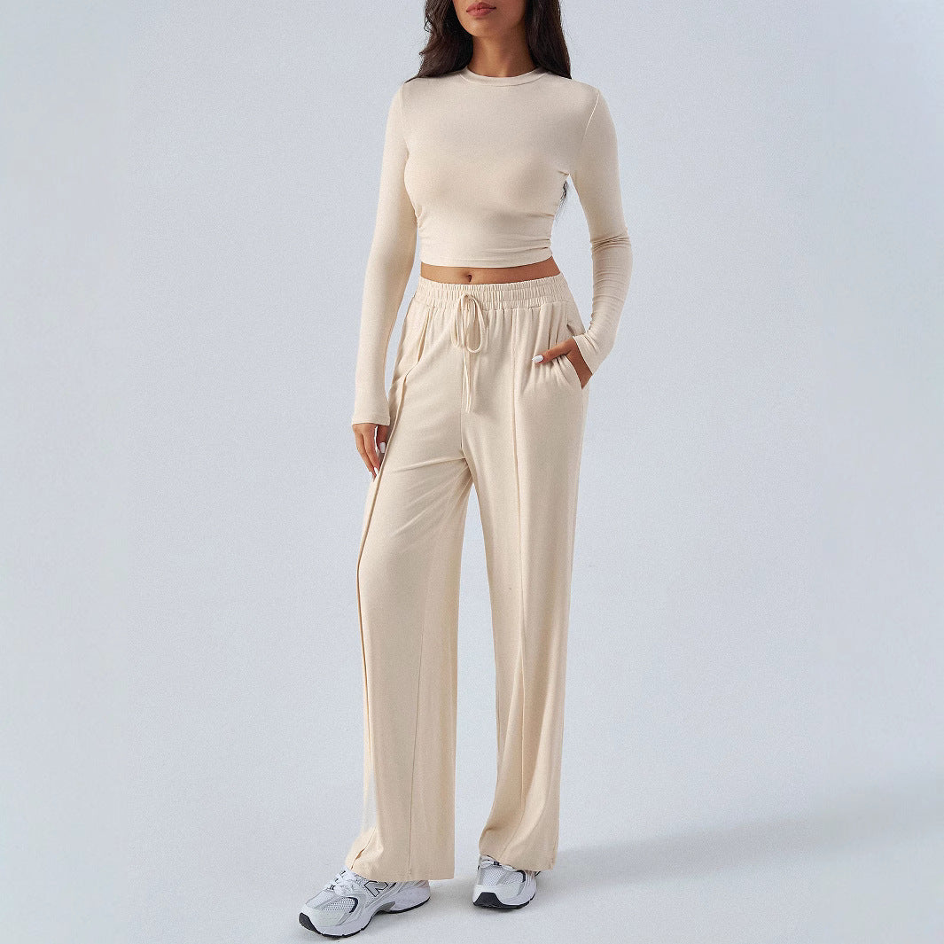 Dame Elegant lounge-outfit med stribet top og behagelige bukser Stilla
