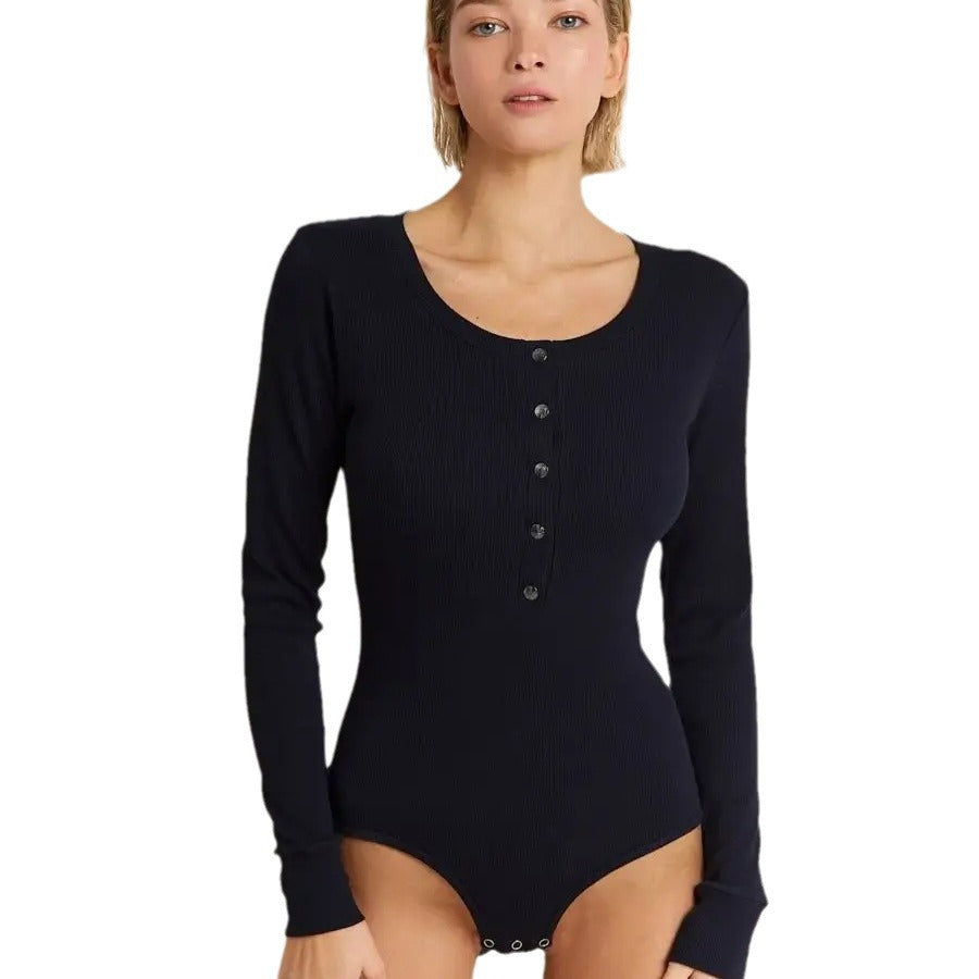 Dame langærmet bodysuit med struktureret design og modige knapdetaljer Stilla