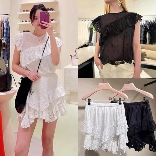 Damebluse med legende spidspuf og elegante detaljer Stilla
