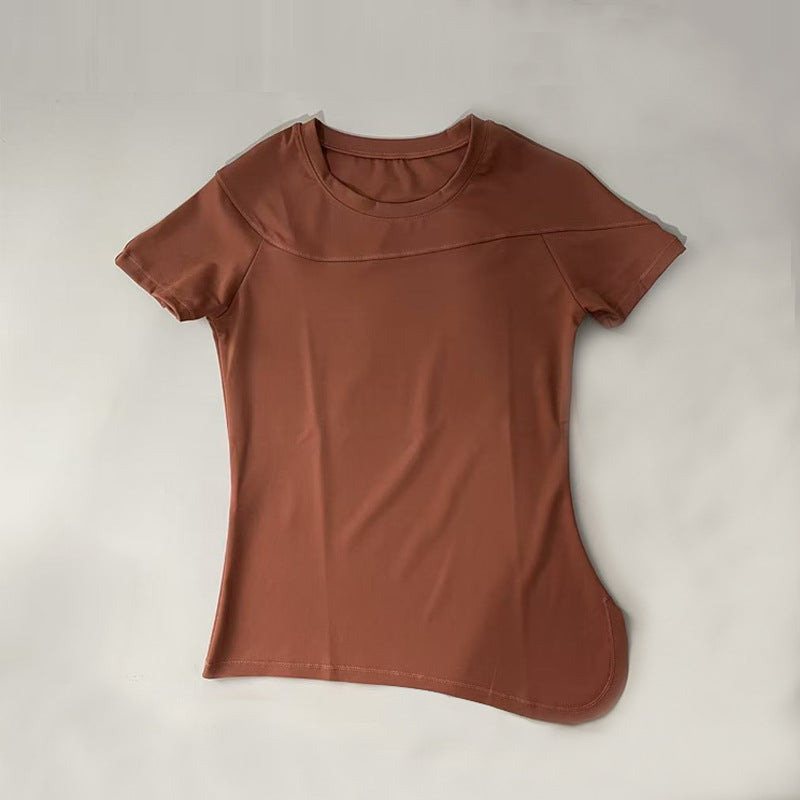 Dame Sports kortærmet T-shirt med innovativ asymmetrisk snit og åndbare egenskaber Stilla