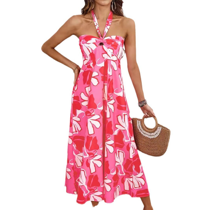 Dame maxikjole med skulderfri design og floral twist Stilla
