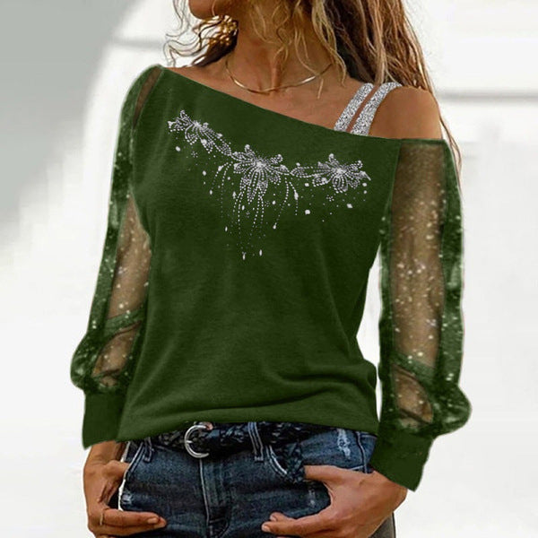 Dame top med transparente detaljer og floral strassdesign Stilla
