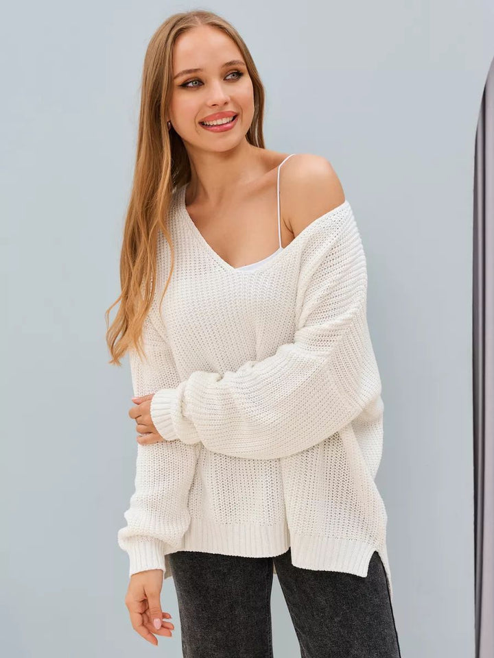 Dame Oversized Strikbluse med asymmetrisk udskæring og brede ribstrikdetaljer Stilla