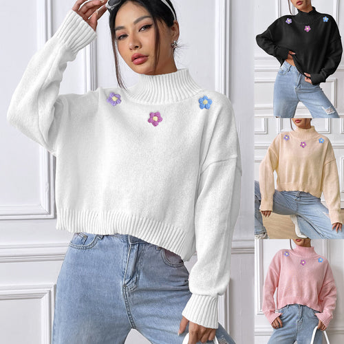 Dame elegant strikpullover med blomstret design og høj krave Stilla