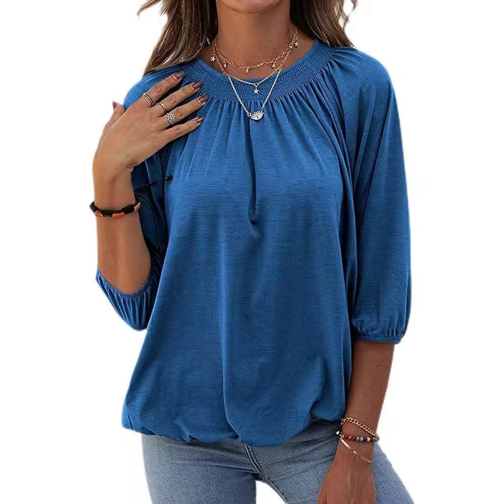 Dame afslappet bluse med casual snit og elastiske pufærmer Stilla