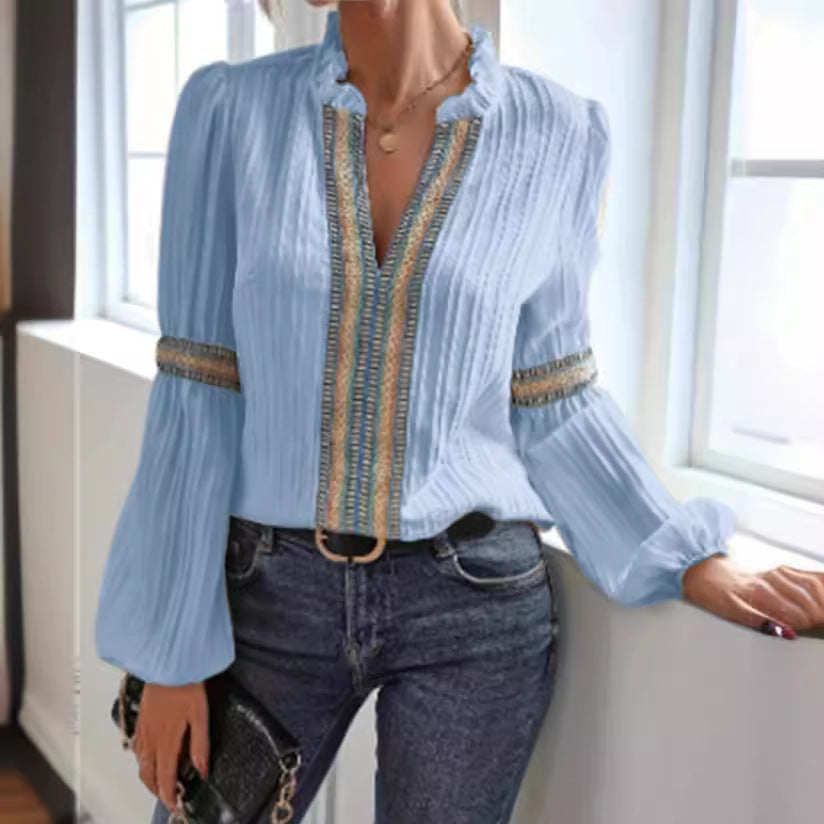 Dame elegant bluse med flæse detaljer og dekorative bånd Stilla
