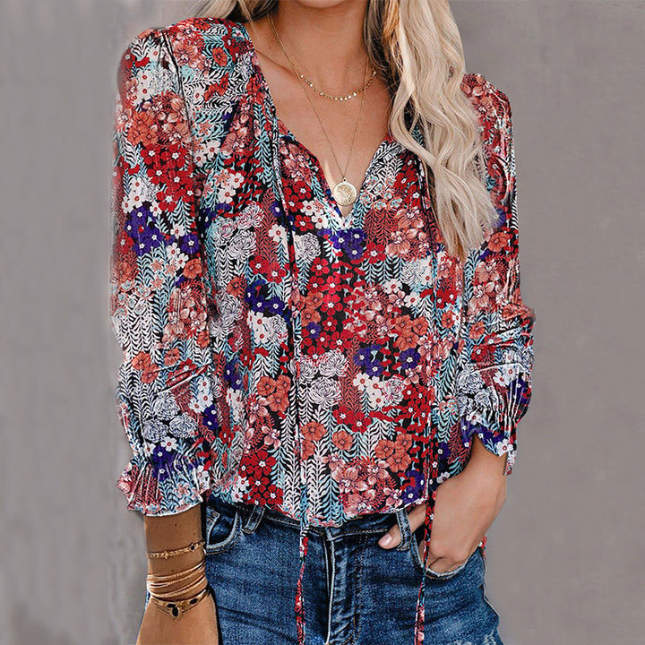 Damebluse med blomsterdesign og løse ærmer Stilla