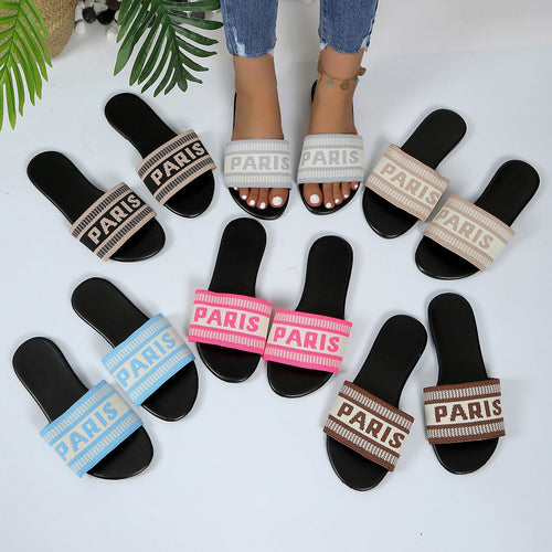Dame modeslidesandaler med trendy skriftzug Stilla