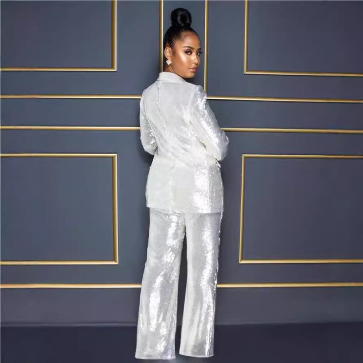 Dame Glitterende Jumpsuit sæt med tætsiddende silhuet og glitrende detaljer Stilla