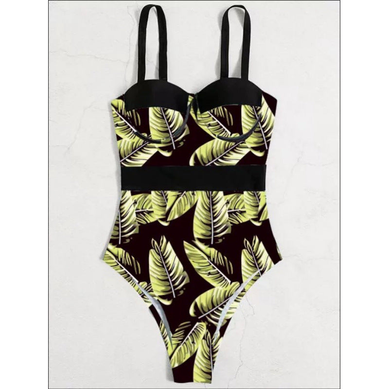 Dame one-piece badedragt med blomstret design og elegant silhuet Skovae