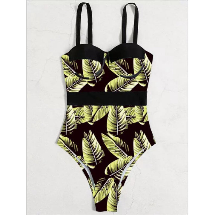 Dame one-piece badedragt med blomstret design og elegant silhuet Skovae