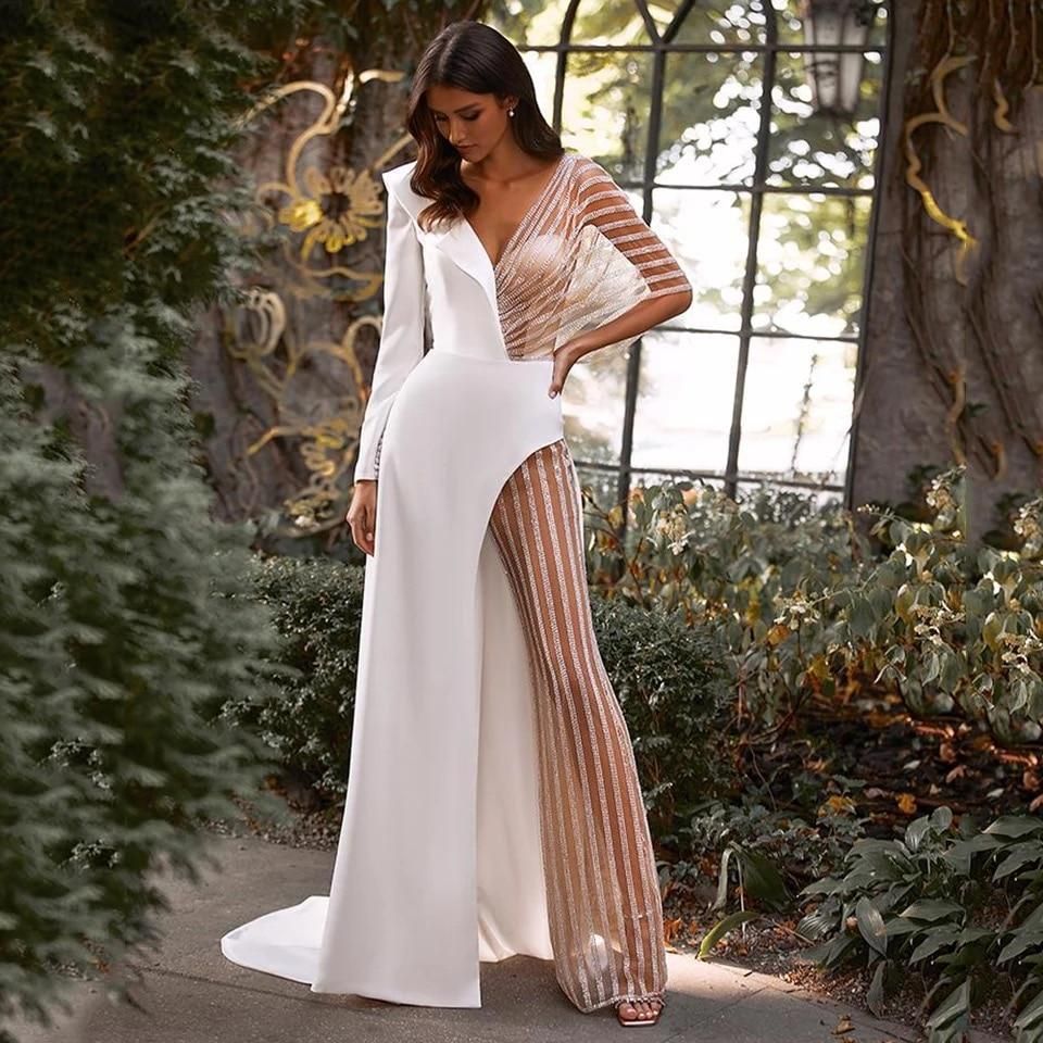 Dame Elegant Jumpsuit med asymmetrisk snit og glitrende accenter Stilla