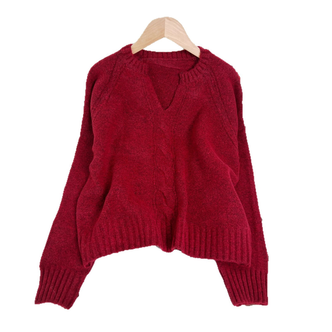 Kvinders strikket sweater med dyb V-hals og kabelmønster Stilla