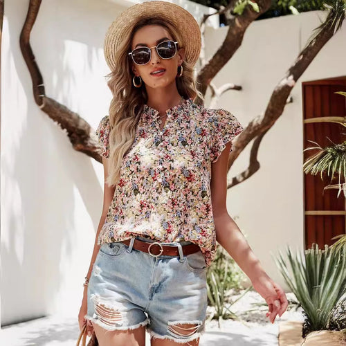 Damebluse med blomstertryk og flæsedetaljer Stilla