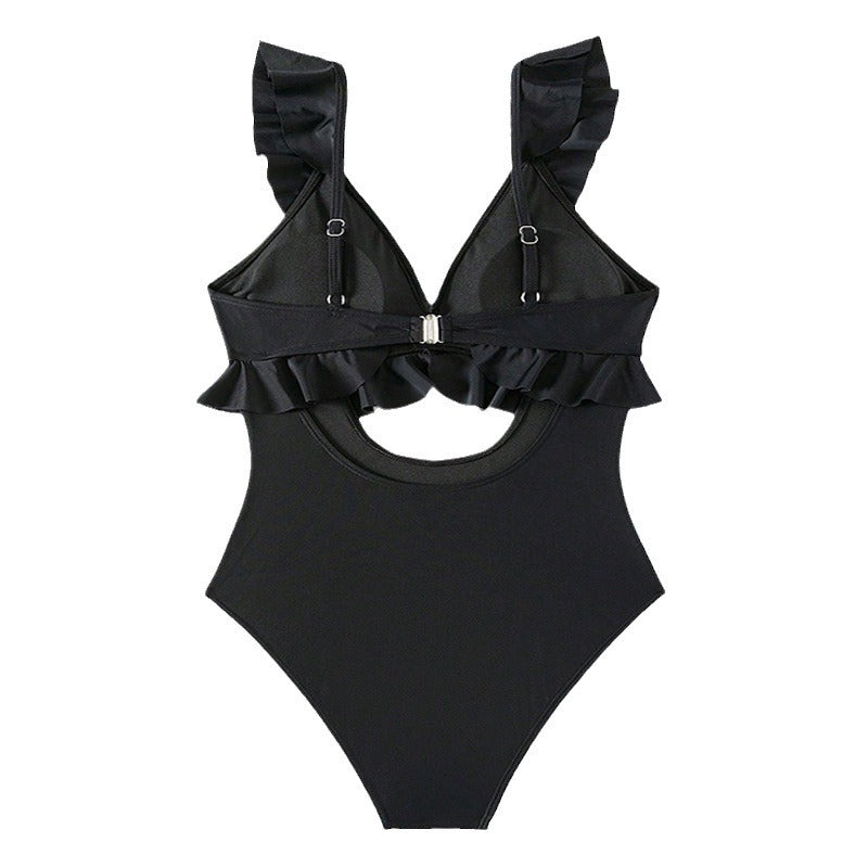 Dame ét forstået badedragt med ruffle detaljer og elegant cut-out Skovae