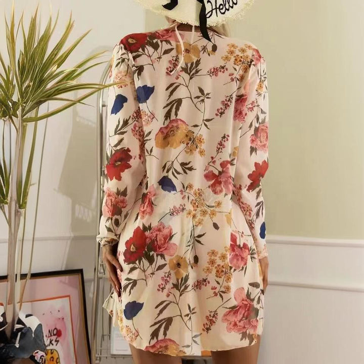 Dame bikinisæt med transparent cover-up og blomsterdesign Stilla