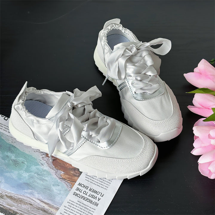 Dame Sneakers i elegant satin-design med moderne båndlukning Stilla