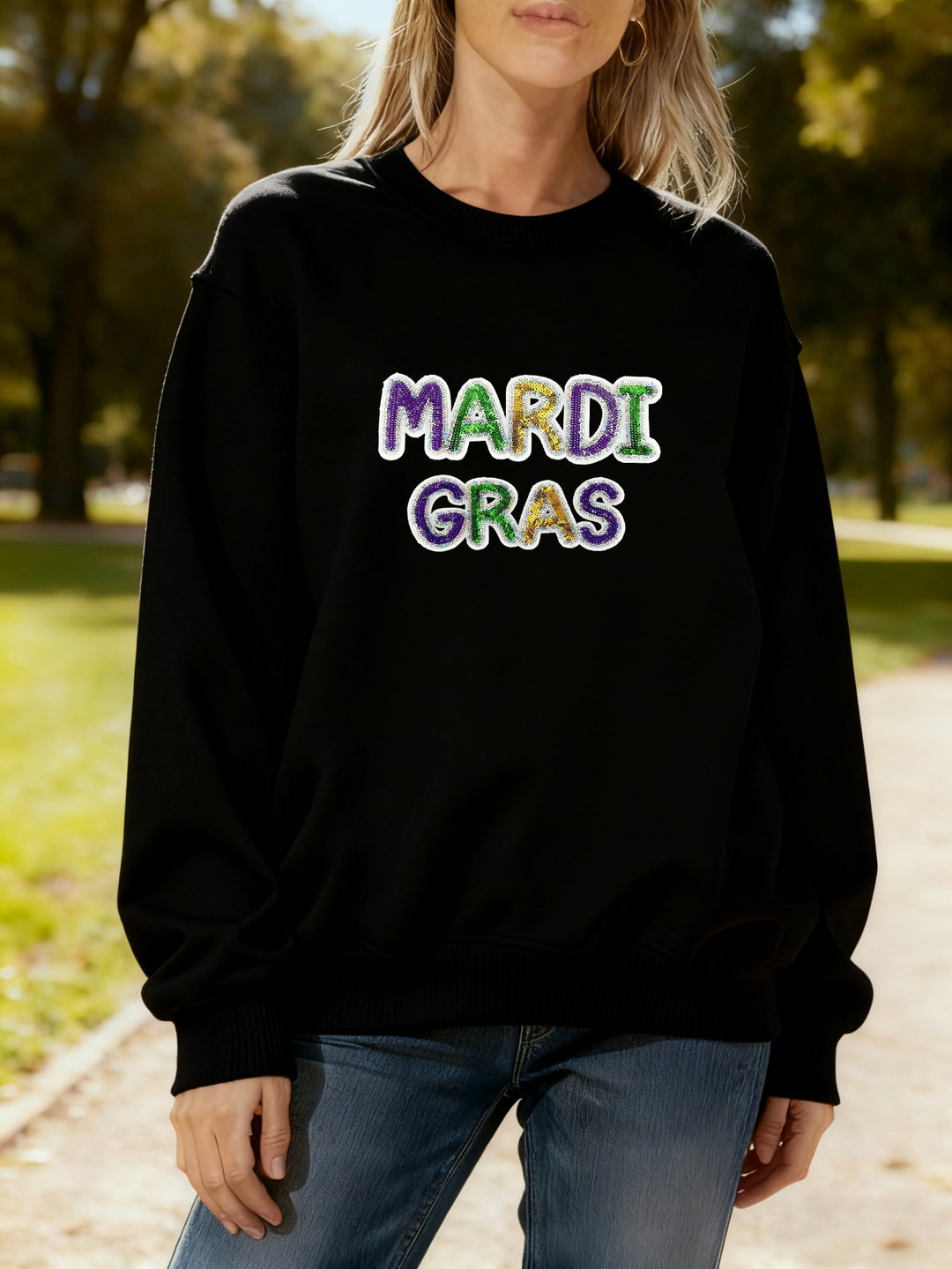Women's sweatshirt with vibrant Mardi Gras lettering Stilla