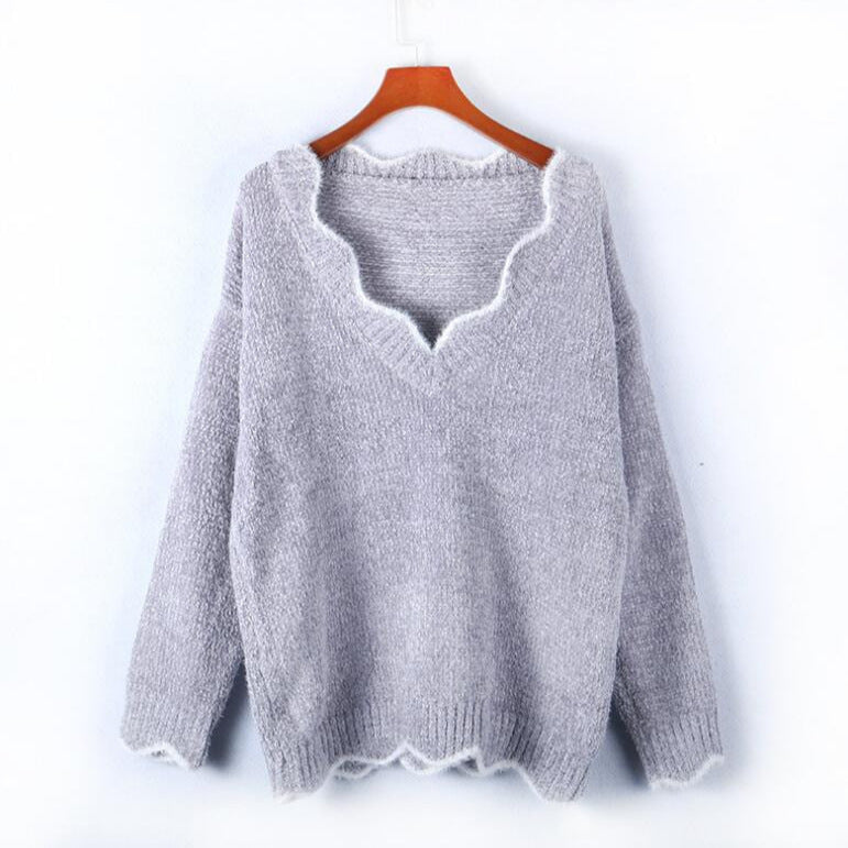 Kvinders bløde strik pullover med V-hals og bølget kant Stilla