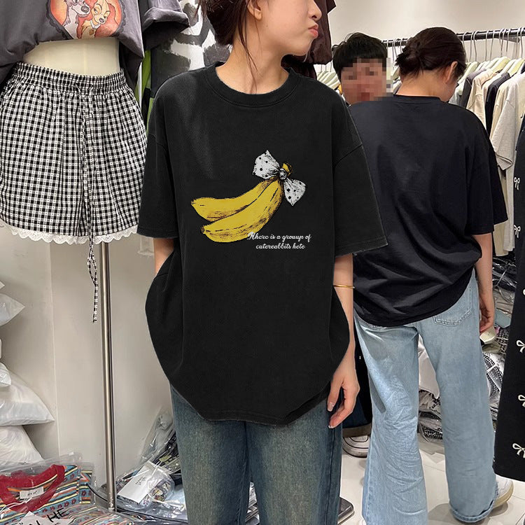 Dame T-shirt med kreativt bananmotiv og afslappet snit Stilla