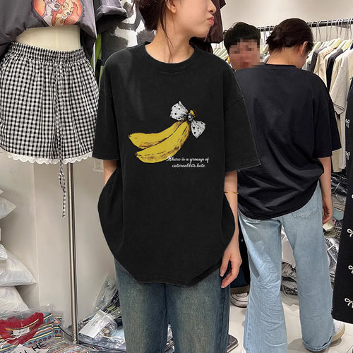 Dame T-shirt med kreativt bananmotiv og afslappet snit Stilla