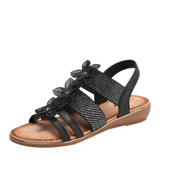 Dame sandaler med blomstret accent og justerbart remdesign Stilla