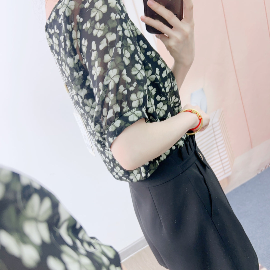 Dame elegante shorts med blomsterprint og figursyet design Stilla