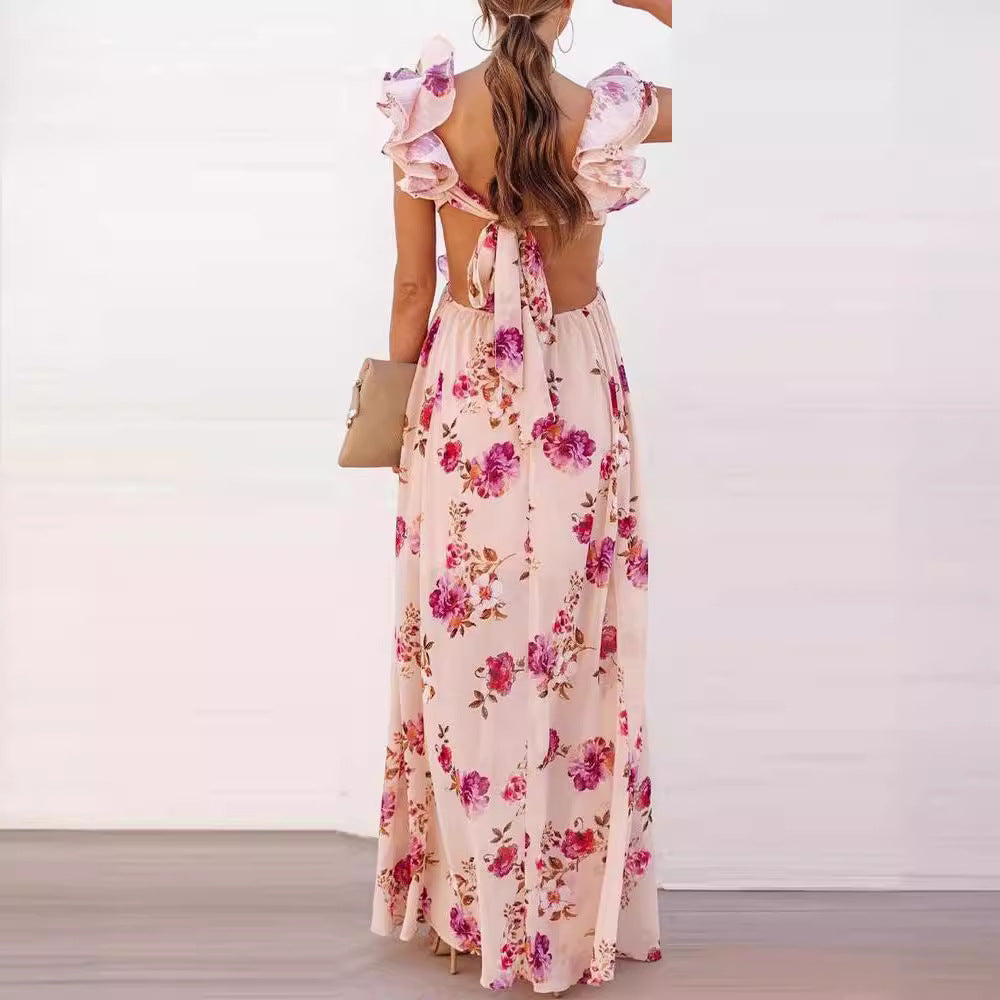 Dame maxikjole med voluminøse flæser og blomsterdesign Stilla