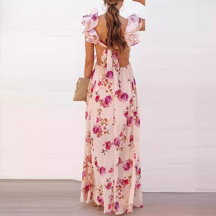 Dame maxikjole med voluminøse flæser og blomsterdesign Stilla