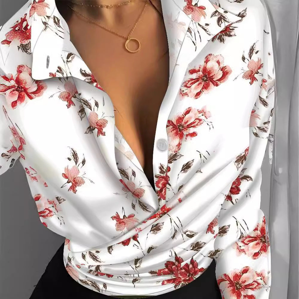 Damebluse med kreativttryk og elegante detaljer Stilla