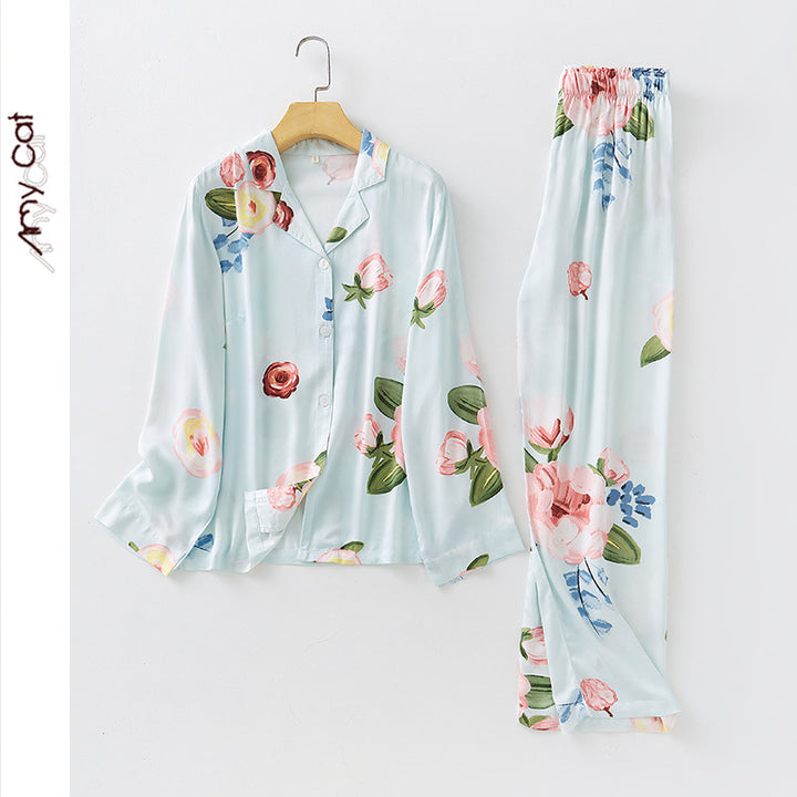 Dame elegant pyjamasæt med blomstret design og knapbar top Stilla