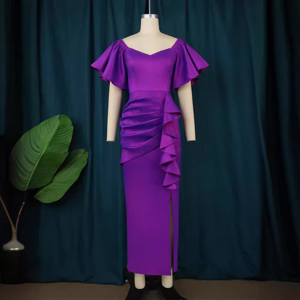 Damer Elegante Maxikjole med voluminøse ærmer og asymmetrisk flæse-design Skovae