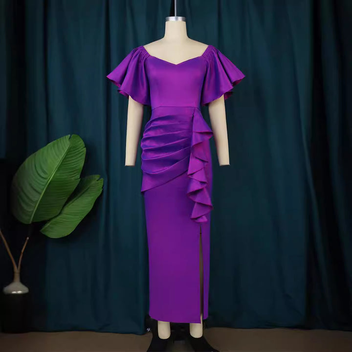 Damer Elegante Maxikjole med voluminøse ærmer og asymmetrisk flæse-design Skovae