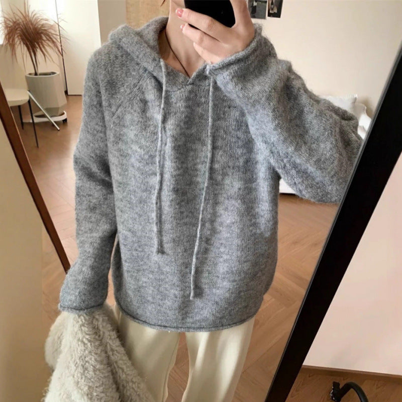 Kvinders hyggelige hætte sweatshirt lavet af blødt fleece-materiale med kengurulomme Stilla