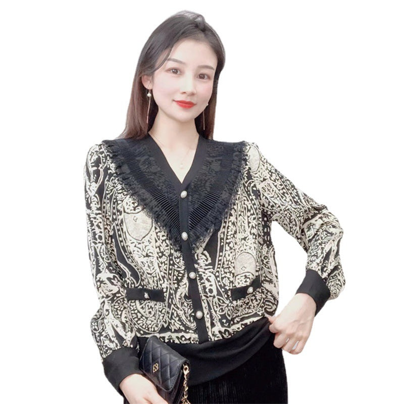 Damebluse med unik spidskrave og elegant tryk Stilla