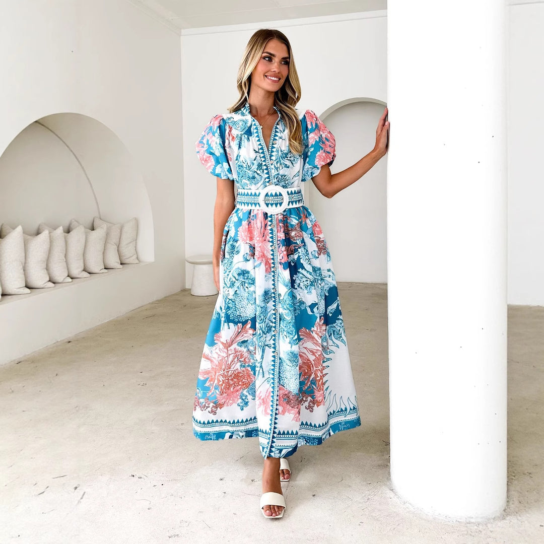 Dame Maxi-kjole i elegant blomsterdesign med voluminøse pufærmer og taljebælte Stilla
