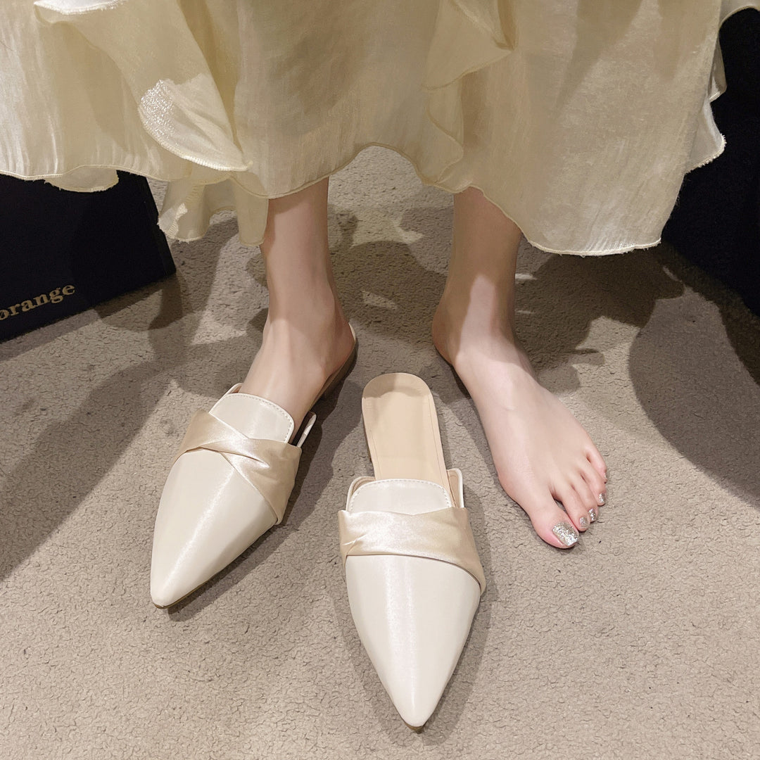 Dame klassiske slippers med smart sløjfeaccent og fint overmateriale Stilla