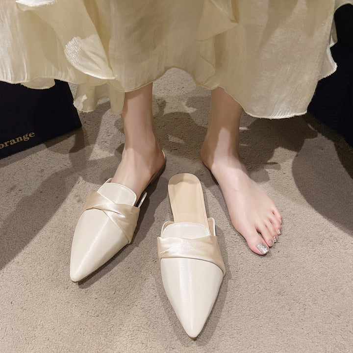 Dame klassiske slippers med smart sløjfeaccent og fint overmateriale Stilla