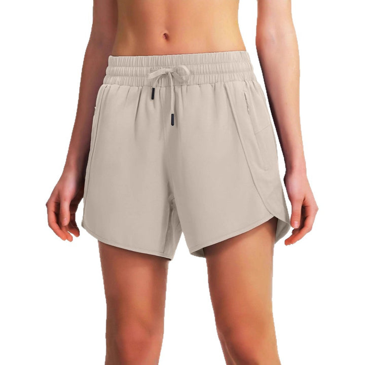 Dame åndbare sportshorts med fleksibel linning og lynlåslommer Stilla